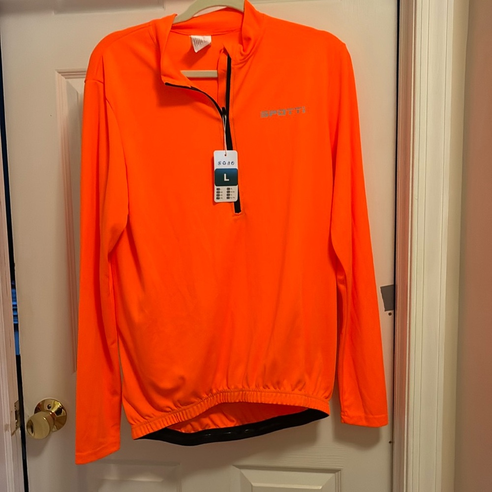 NWT Mrn’s long sleeve bike shirt. Bright Orange. Size L